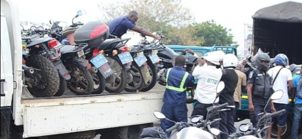 Postal and Courier Commission seizes 100 unlicensed motorbikes in Accra